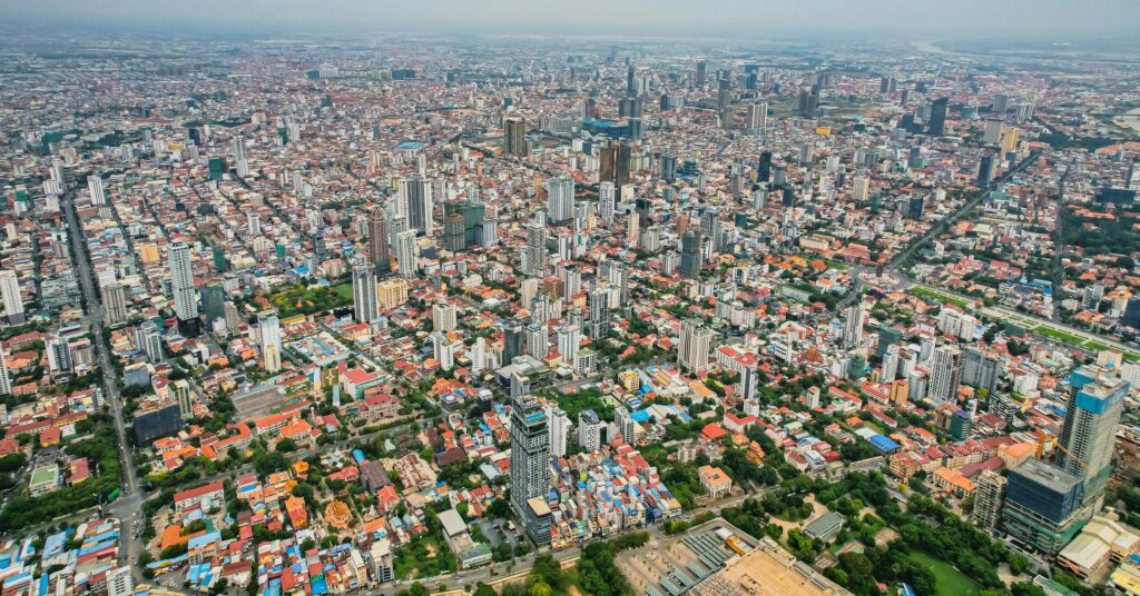 Stunning aerial view of Phnom Penh showcasing its bustling urban landscape and skyline.