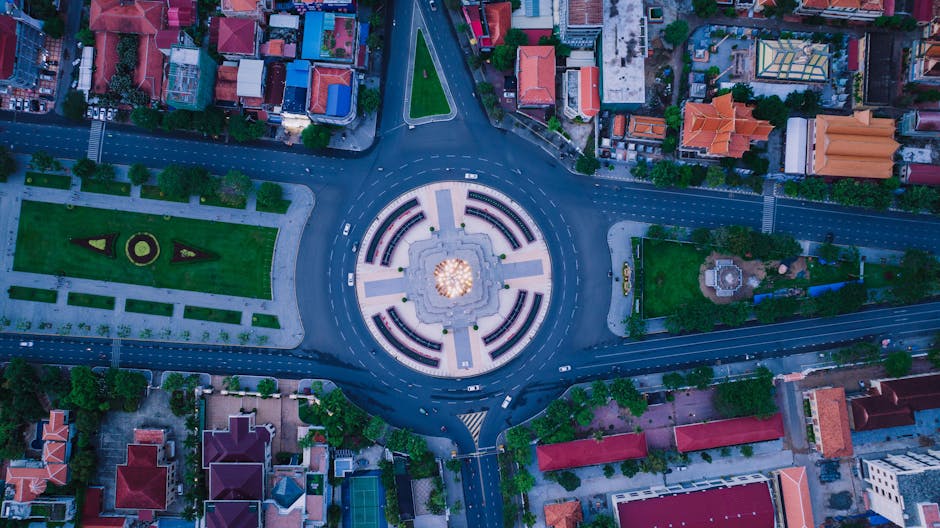 Stunning aerial view of a roundabout in Phnom Penh, Cambodia showcasing the city's vibrant streets.