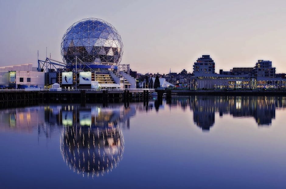 Stunning sunset reflection of Science World geodesic dome at Vancouver's False Creek.